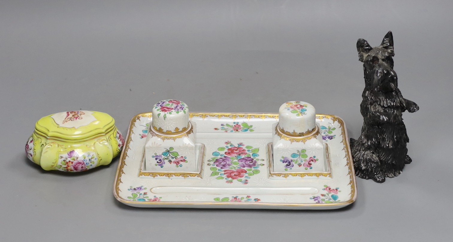 A Samson Paris inkstand and a porcelain box and cover and a porcelain model of a Scots terrier, inkstand 26cms wide